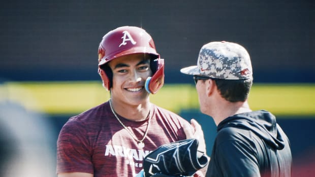 Wehiva Aloy talks to Bobby Wernes during a fall scrimmage